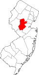 A county landlocked by other counties in the northern part of the state. It is small.