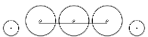 Diagram of one small leading wheel, three large driving wheels joined together with a coupling rod, and one small trailing wheel