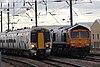 Ely - GTSR Great Northern 387114 passing GBRf 66731.JPG