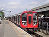 London Underground S7 Stock 21311 on District Line, Ealing Broadway (14280744997).jpg