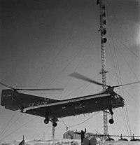 Helicopter servicing the Mid-Canada Line.jpg
