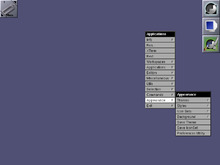 Default look of the Window Maker environment, with dock at upper right, an open menu and the clip at upper left.