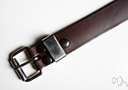 belt buckle - the buckle used to fasten a belt