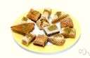 baklava - rich Middle Eastern cake made of thin layers of flaky pastry filled with nuts and honey