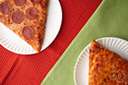 pizza pie - Italian open pie made of thin bread dough spread with a spiced mixture of e.g. tomato sauce and cheese