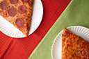 pizza - Italian open pie made of thin bread dough spread with a spiced mixture of e.g. tomato sauce and cheese