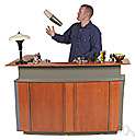 bartender - an employee who mixes and serves alcoholic drinks at a bar
