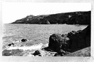 headland - a natural elevation (especially a rocky one that juts out into the sea)