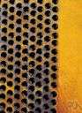beeswax - a yellow to brown wax secreted by honeybees to build honeycombs