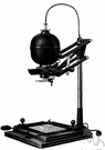 enlarger - photographic equipment consisting of an optical projector used to enlarge a photograph