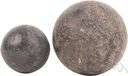 abrading stone - a primitive stone artifact (usually made of sandstone) used as an abrader