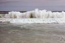 tidal bore - a high wave (often dangerous) caused by tidal flow (as by colliding tidal currents or in a narrow estuary)