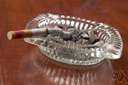 ashtray - a receptacle for the ash from smokers' cigars or cigarettes