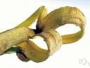 banana peel - the skin of a banana (especially when it is stripped off and discarded)