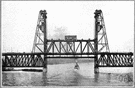 Lift bridge - a bridge that can be raised to block passage or to allow boats or ships to pass beneath it