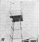 observation tower - a structure commanding a wide view of its surroundings
