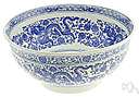 willowware - chinaware decorated with a blue Chinese design on a white background depicting a willow tree and often a river