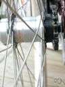wheel spoke - support consisting of a radial member of a wheel joining the hub to the rim
